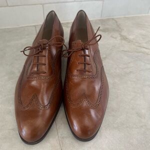 Salvatore Ferragamo Brown Leather Flats with Polished Finish